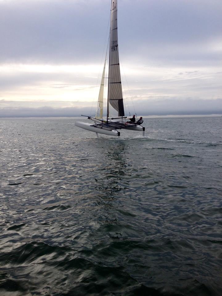 Pegasus-MotionX flying/foiling upwind ahead of the incoming storm. Amazing!